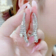 cross curved earrings 9